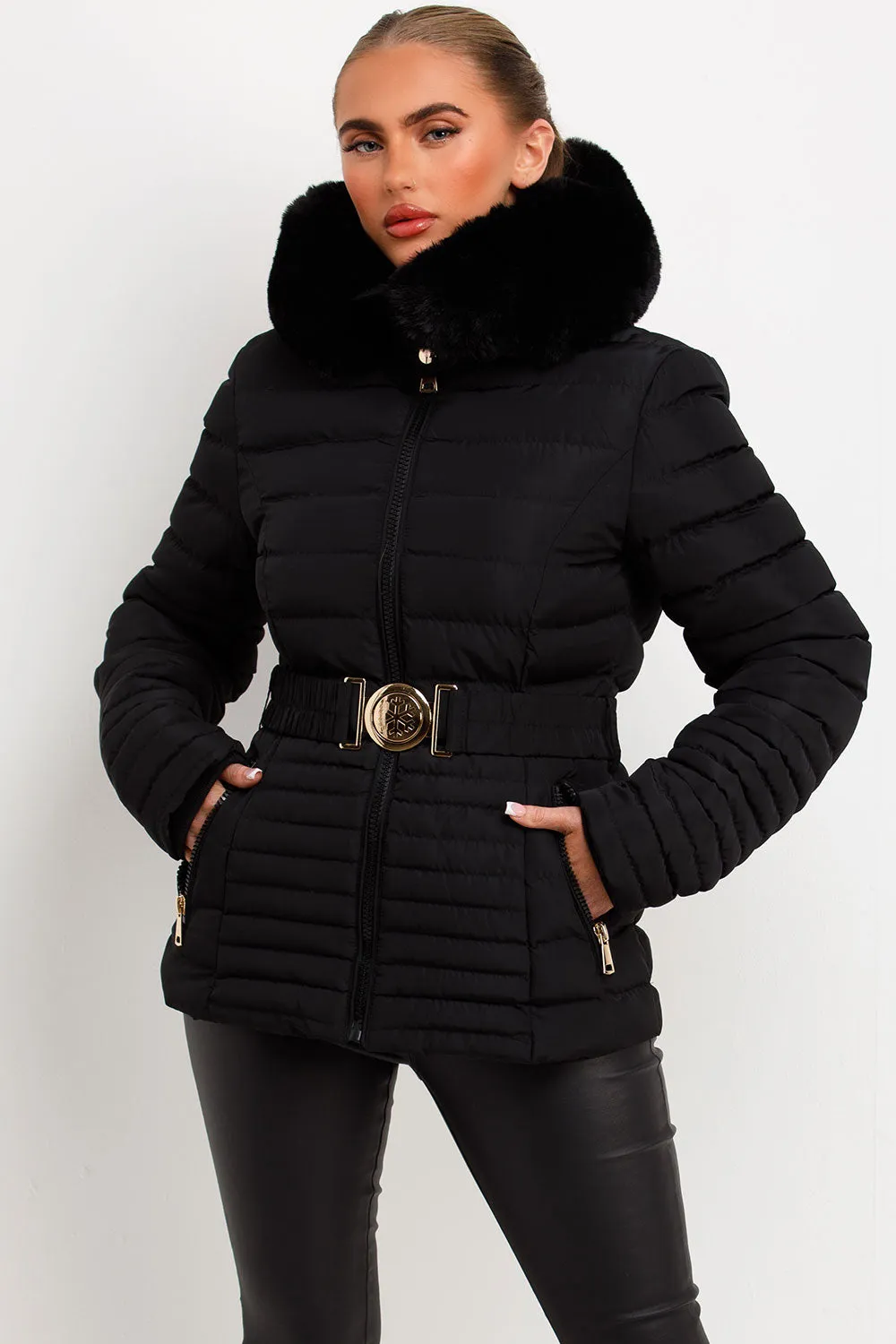 Black Puffer Jacket With Faux Fur Hood And Gold Belt